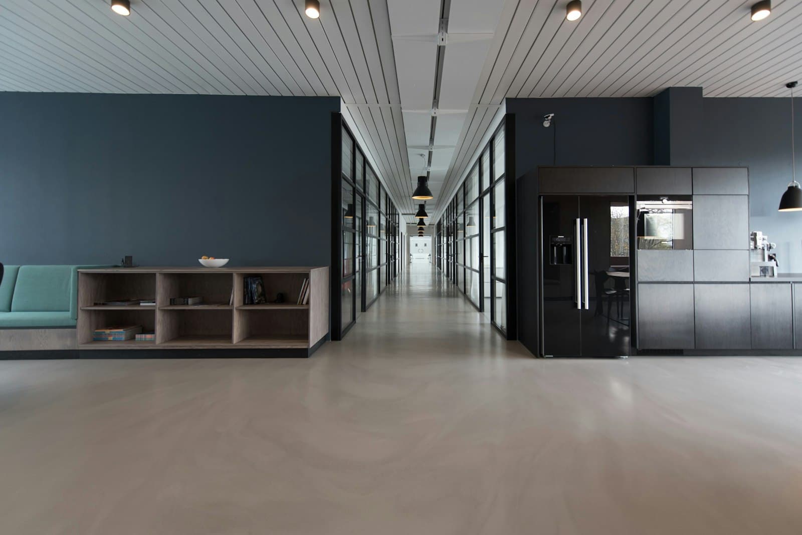 Inside the Apllex office — open workspace and meeting rooms